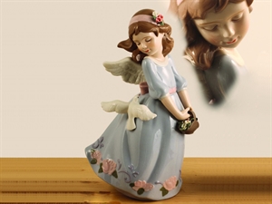 48346 BIMBA con ALI 30cm PORCELLANA